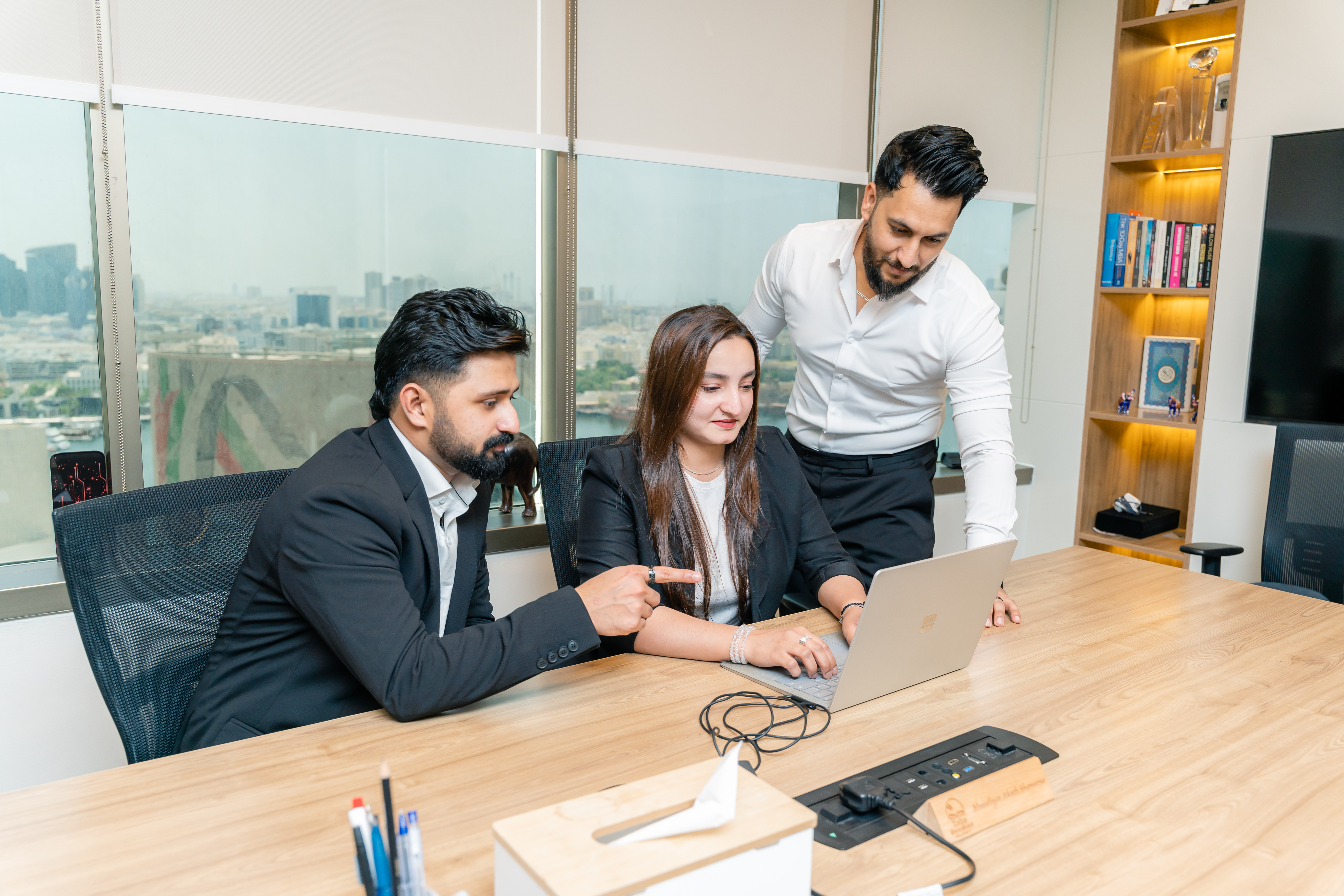 HR professionals collaborating in a modern office